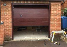 half-open brown garage door
