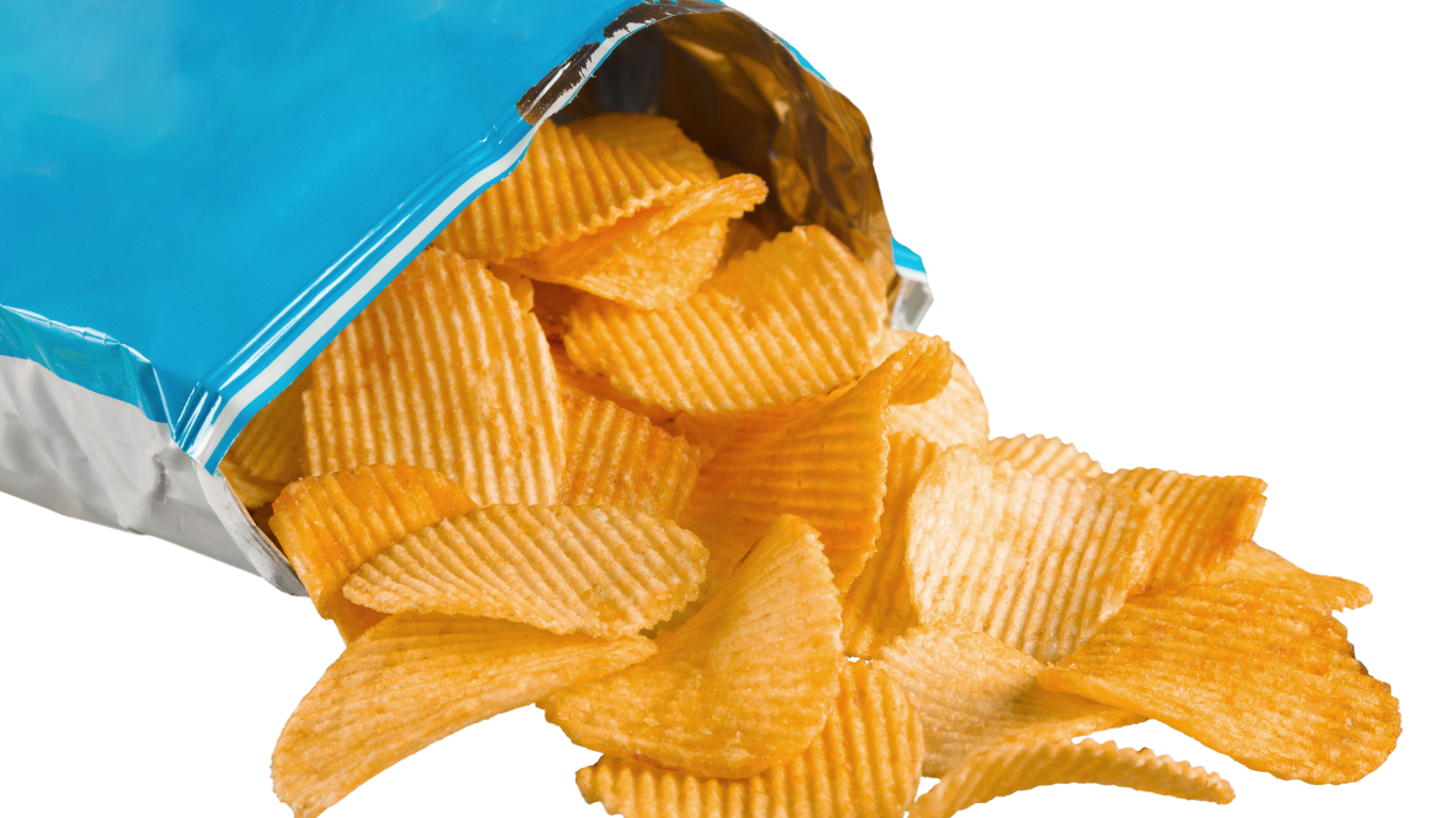 Bag of potato chips, partially opened, spilling out onto a surface.
