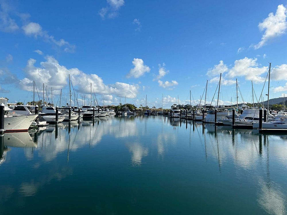 Scenic Marina Views on a Sunny Day with Docked Boats — Mediterranean Food in Airlie Beach, QLD