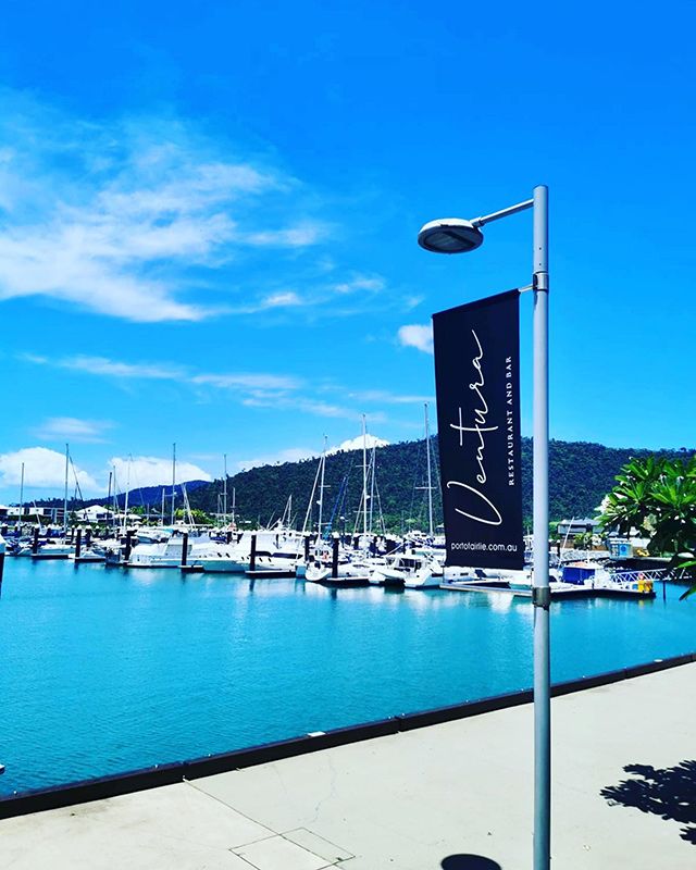 Inviting Seaside Ambiance with a Prominent sign Welcomes you to Ventura Restaurant and Bar — Mediterranean Food in Airlie Beach, QLD