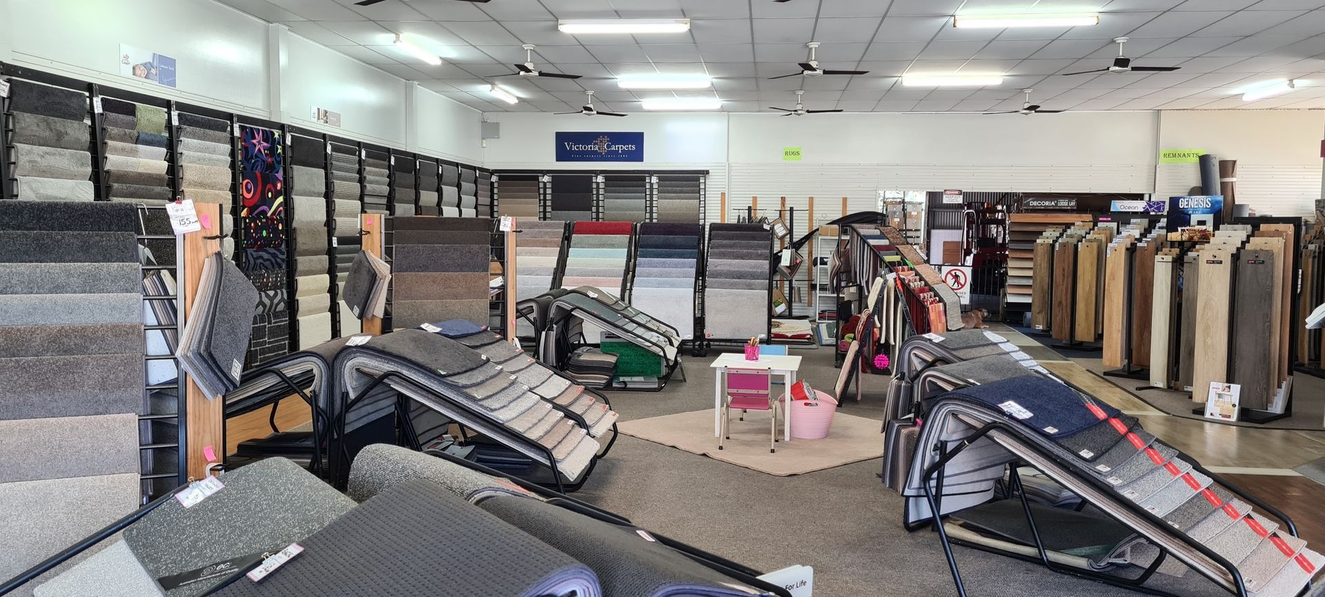 Rugs Samples Displayed on Racks