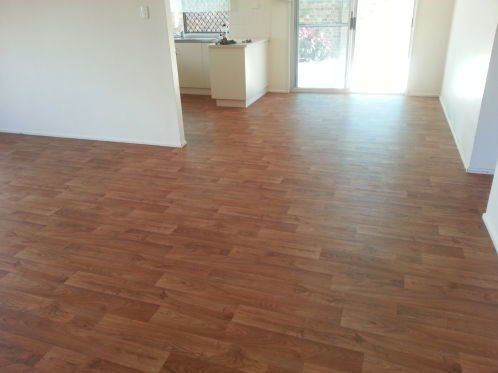 Residential House With Wooden Vinyl Flooring — Flooring - Bundaberg Carpets and Vinyls