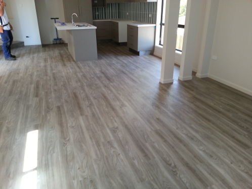 Kitchen And Dining Room With Vinyl Flooring — Flooring - Bundaberg Carpets and Vinyls