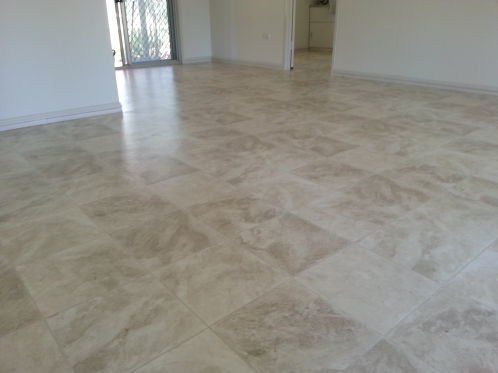 Empty Dining Room With Tiled Flooring — Flooring - Bundaberg Carpets and Vinyls