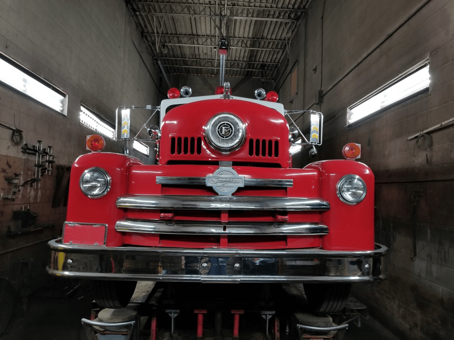 Repairing Red Truck — Grand Rapids, MI — AB Spring Service Inc