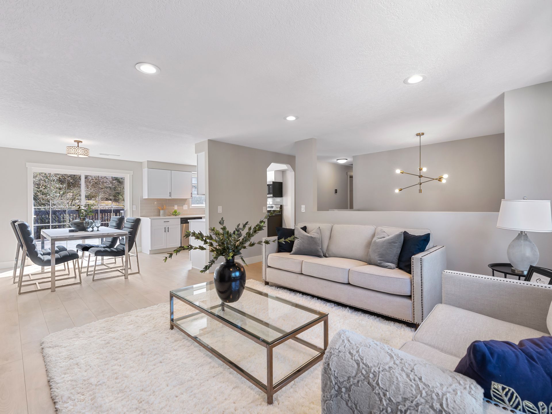 A living room with a couch and a coffee table