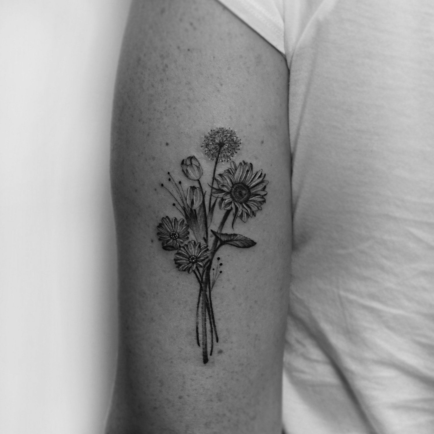 single needle tattoo, tattoo, fine line, black and grey, los angeles, female artist, donatella azygous, bouquet, floral tattoo, dainty tattoo