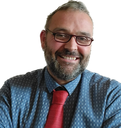 A man with a beard wearing glasses and a red tie