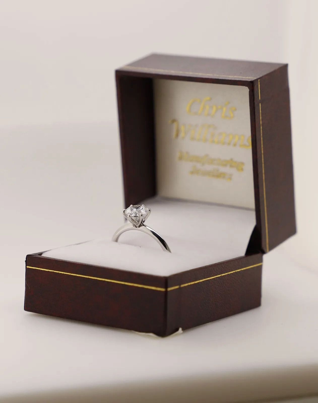 Diamond Engagement Ring in a Brown Jewelry Box — Chris Williams Retail & Manufacturing Jewellers in Wanguri, NT