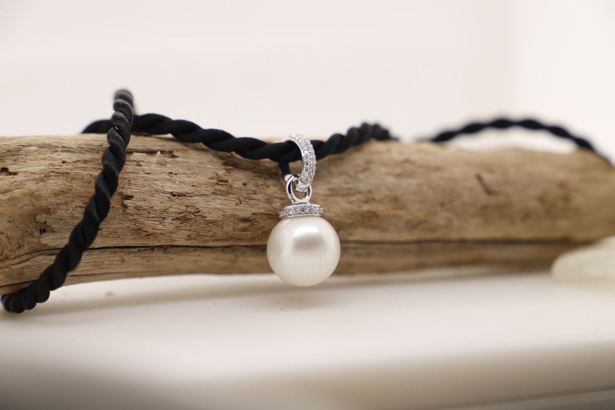 A White Pearl Pendant on a Black Twisted Cord — Chris Williams Retail & Manufacturing Jewellers in Wanguri, NT