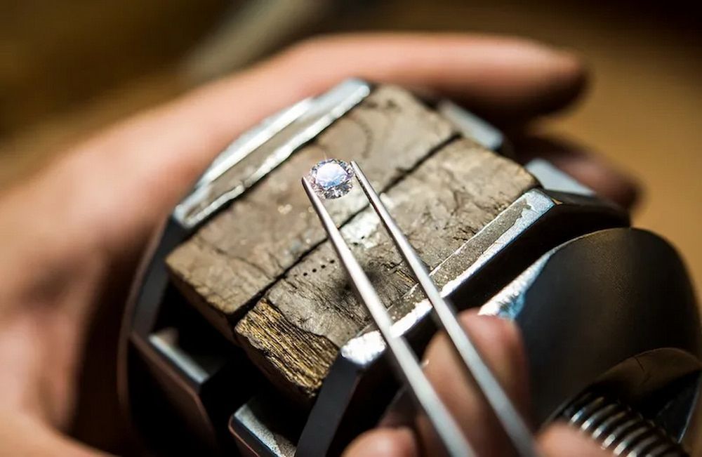 Tweezers Holding a Small Diamond — Chris Williams Retail & Manufacturing Jewellers in Wanguri, NT