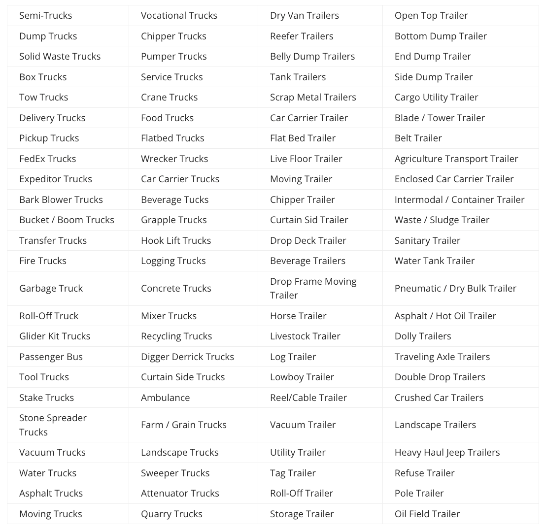 Woman smiling, wearing a black blazer over a red top. Dark, wavy hair. White background.