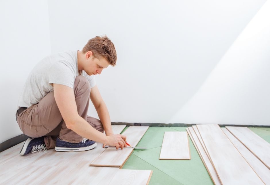 handyman installing new flooring