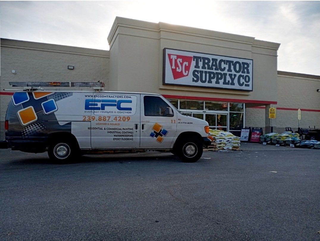 White EFC van parked outside of a Tractor Supply Co. store.