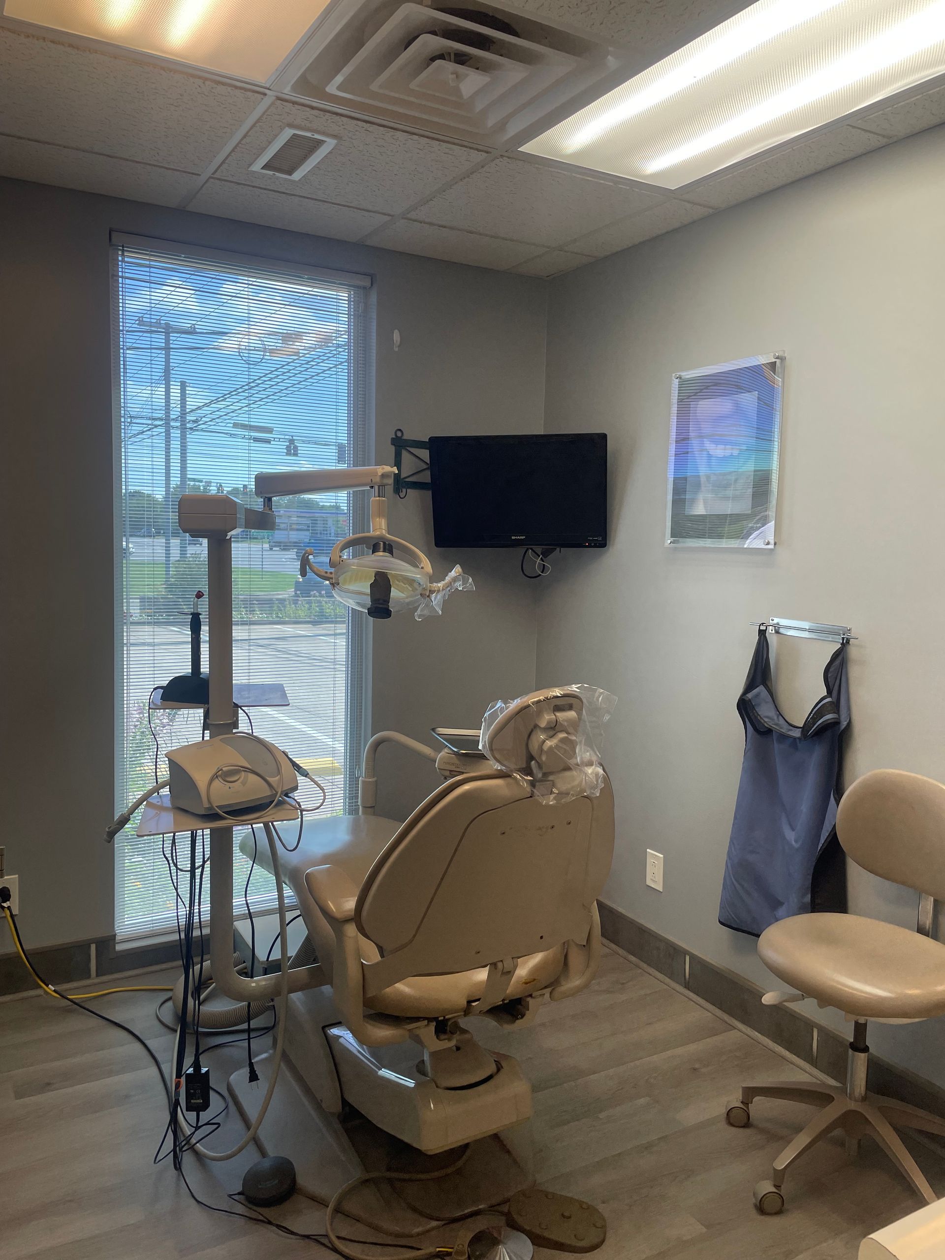 Dentist Checking Clients Mouth — Clarksville, TN — Clarksville Dental Center