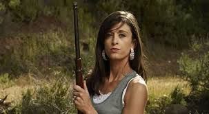 Amanda Hardin competing on Top Shot Season 3, showcasing early marksmanship and calm focus.