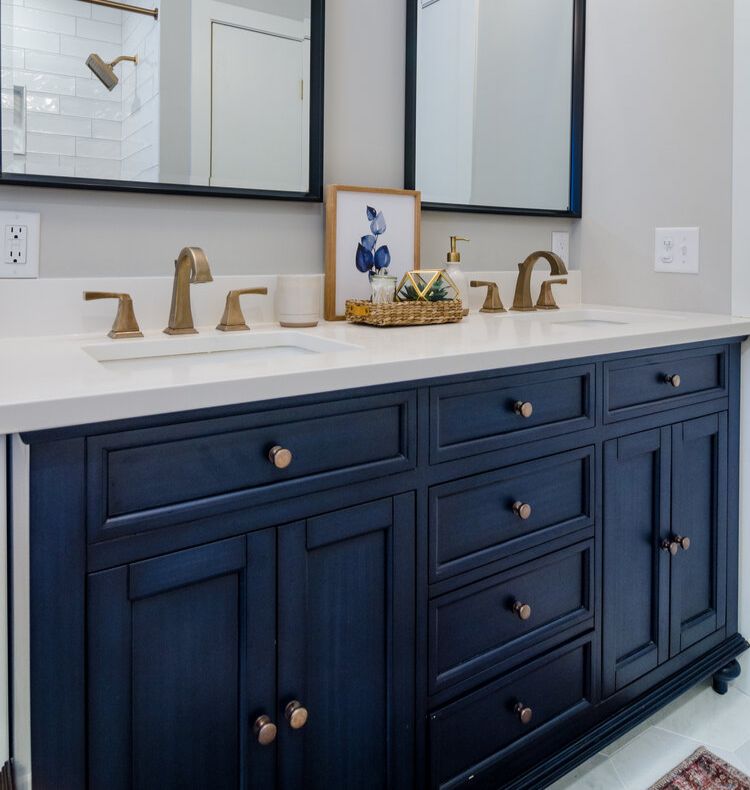 guest bathroom with bold blue double vanity