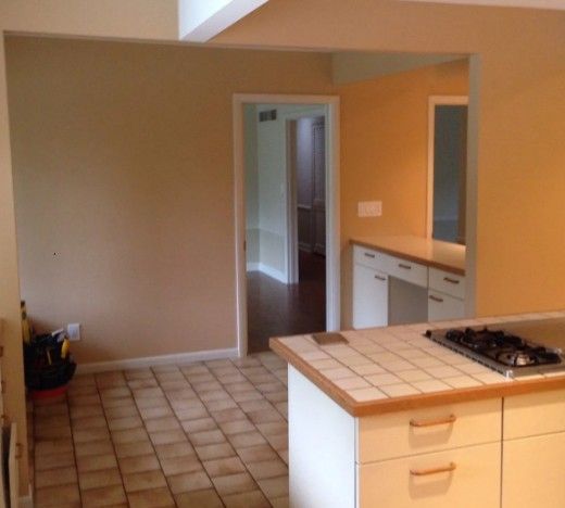 old 1950s kitchen with tile floor and countertops