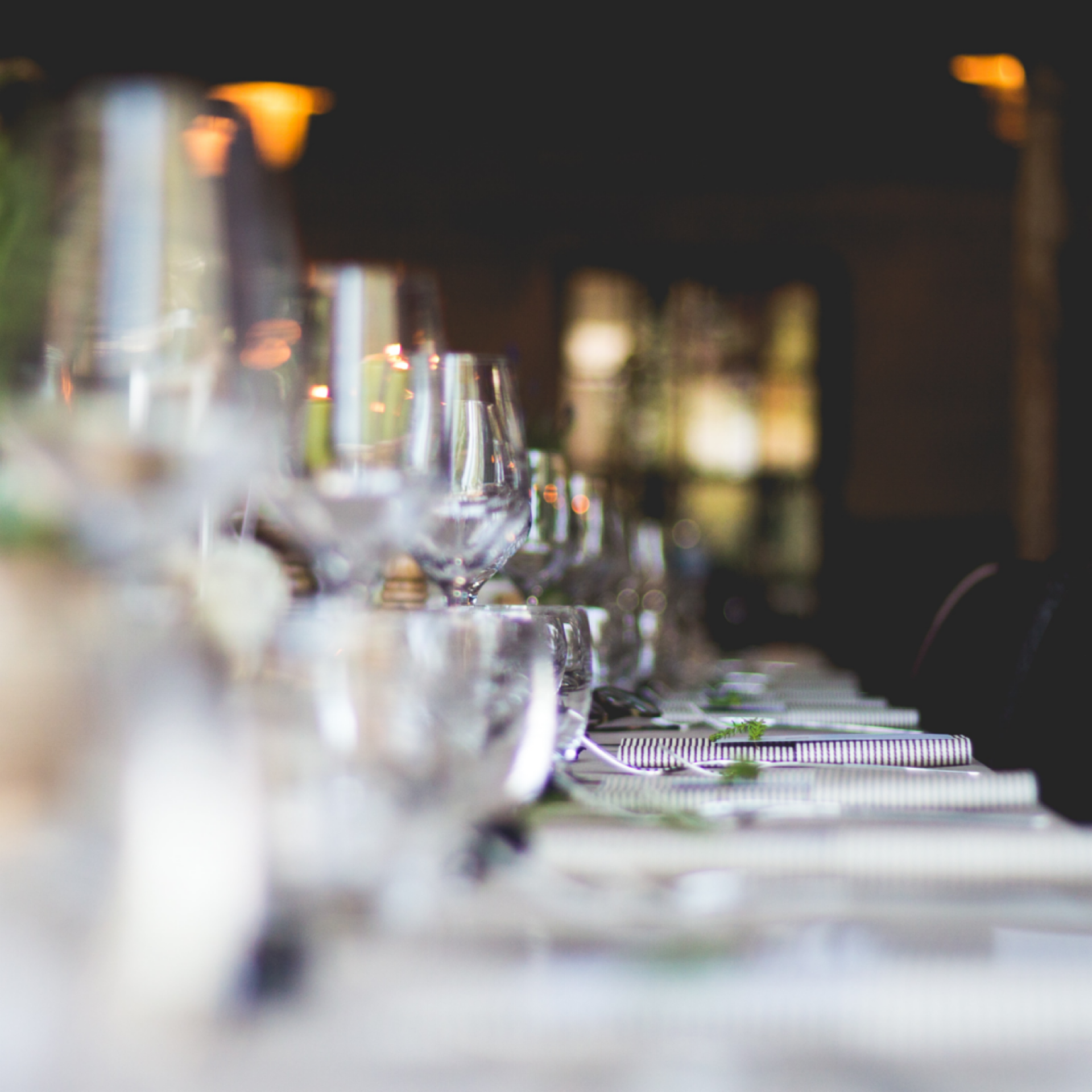 Wine glasses on holiday dinner party table