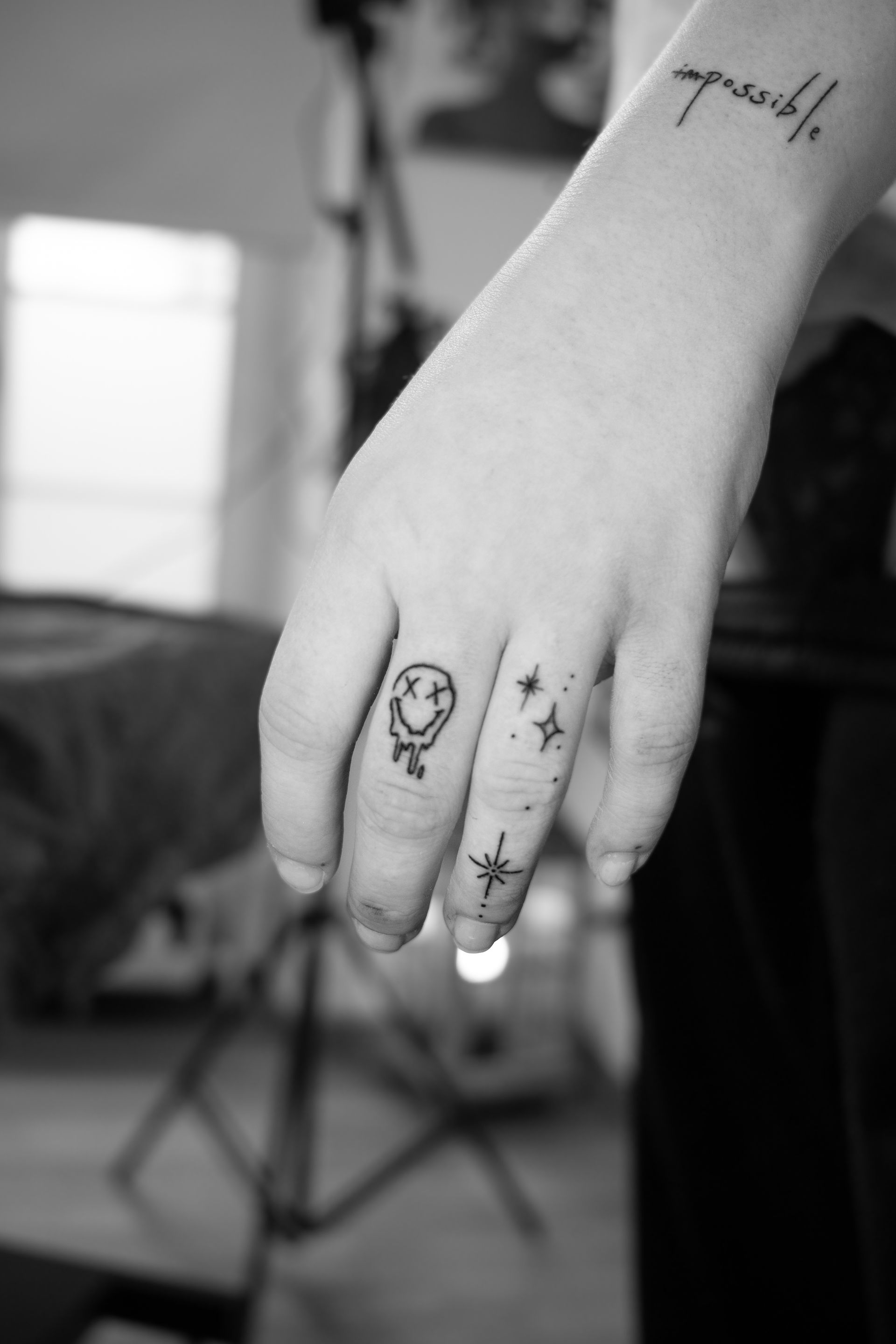 Smile to the stars fine line Tattoo