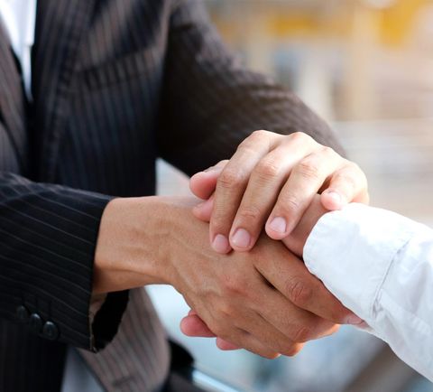 Man Handshaking With His Attorney — Jacksonville, FL  — Special Services of Jacksonville, Inc.