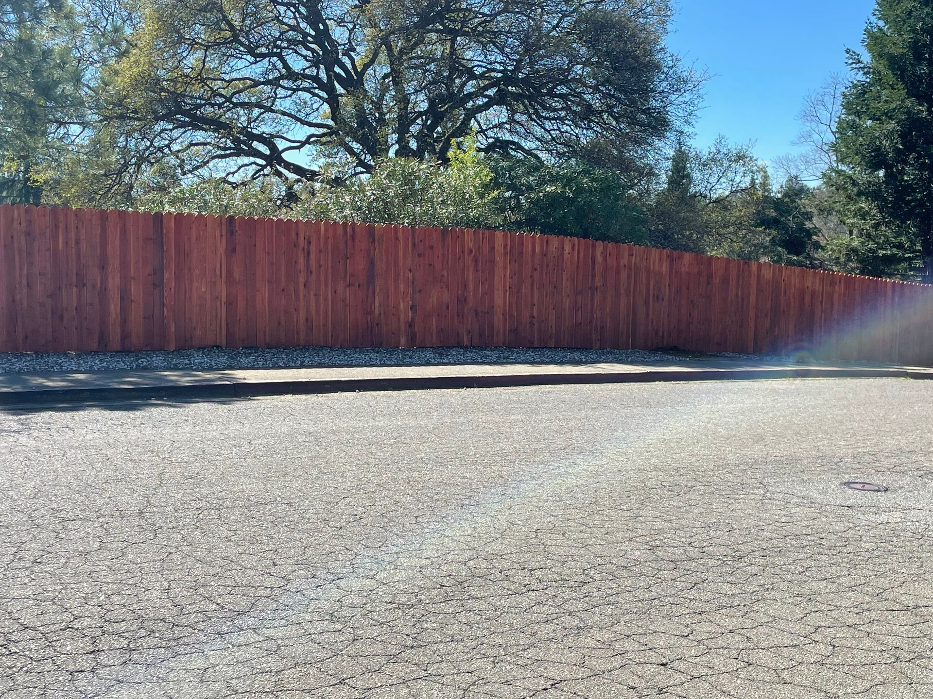 after picture of wood fence restoration and staining of residential home in sacramento