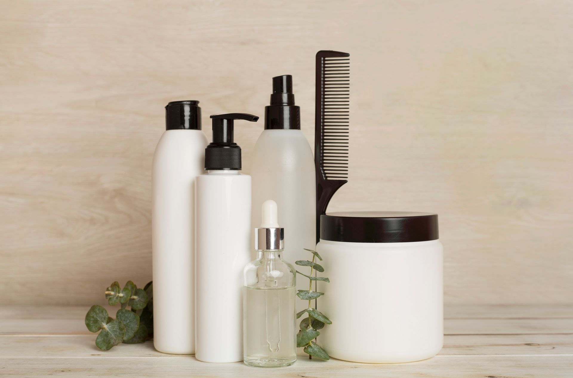 There are many different types of hair products on the table.