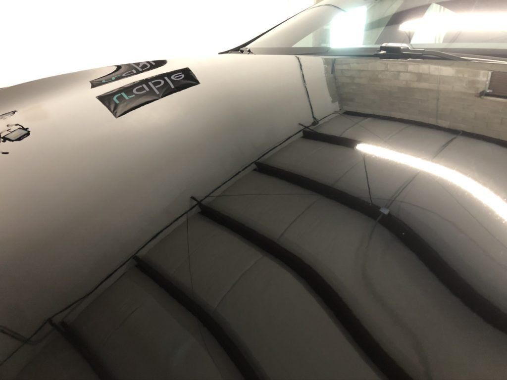 A car with a napkin sticker on the windshield