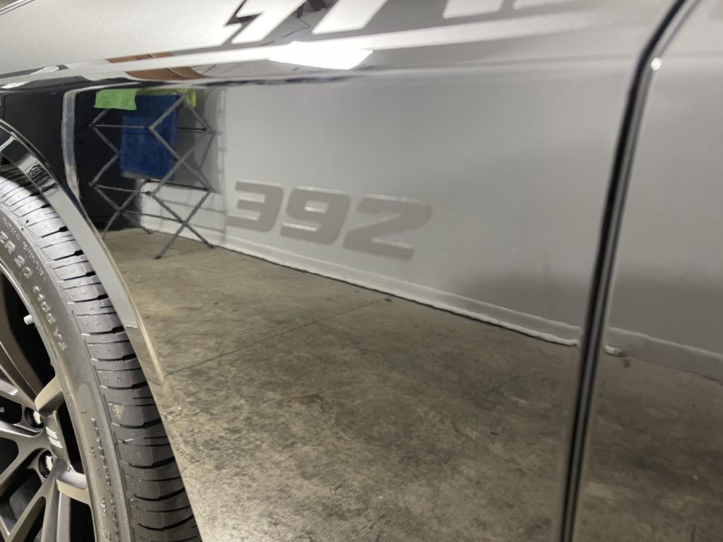 A close up of a car with the number 392 on the side