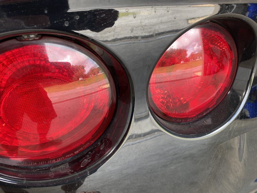 A close up of a car 's tail light.