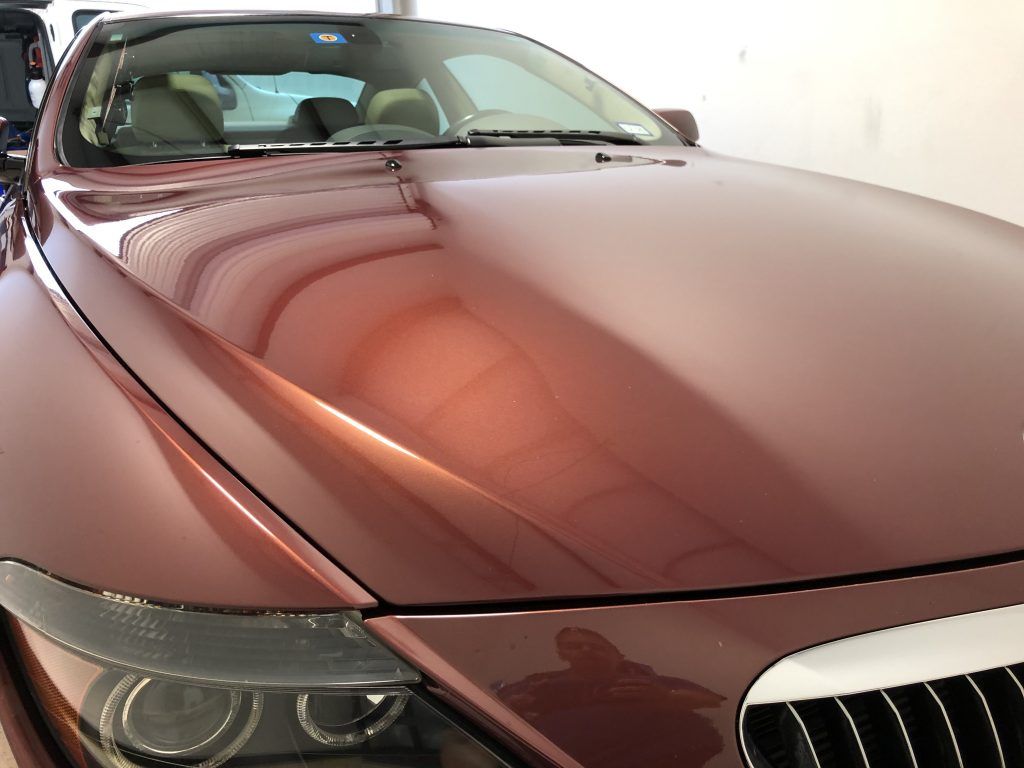 A close up of the hood of a car