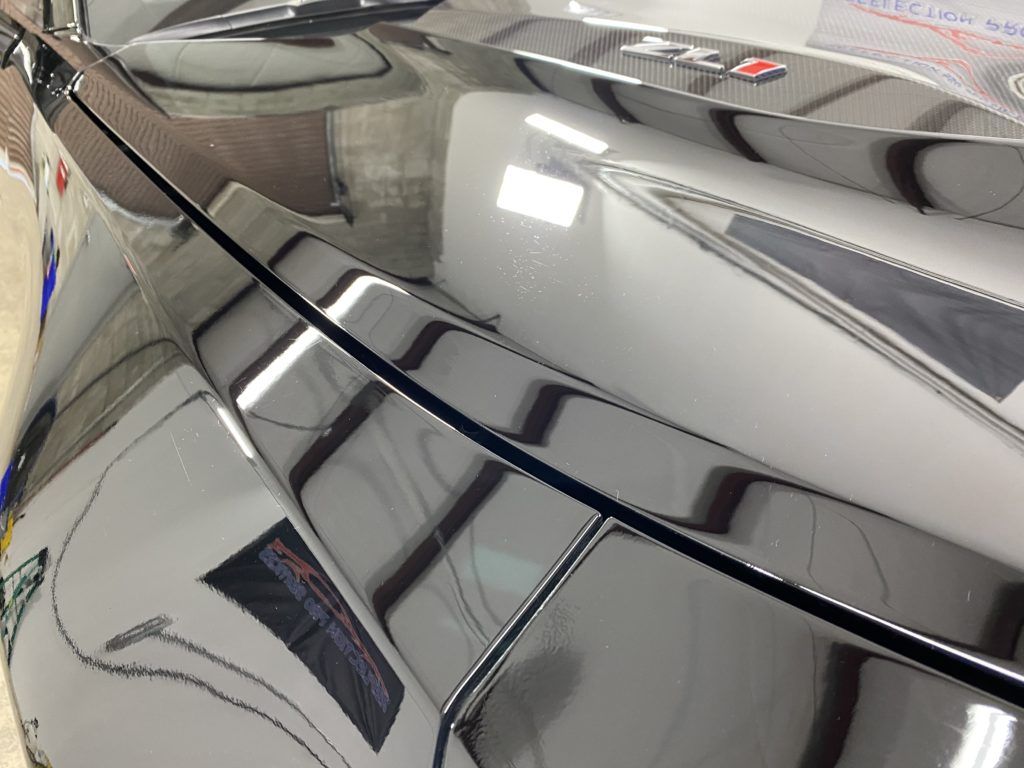 A close up of the hood of a car