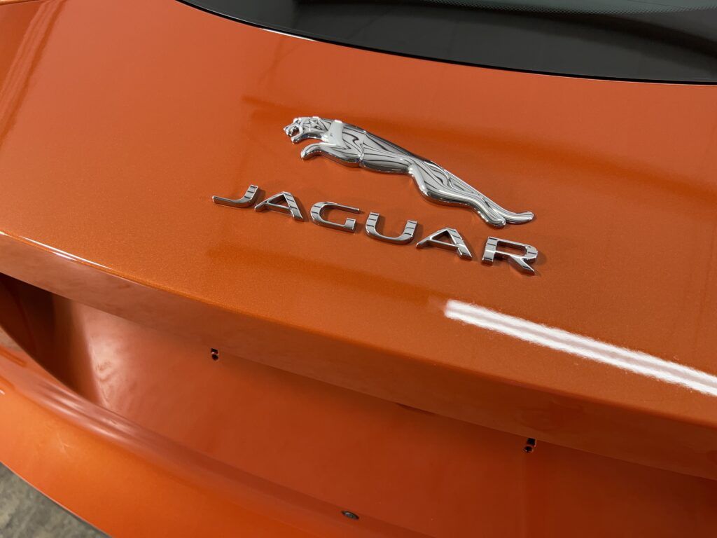 A close up of the back of a jaguar car