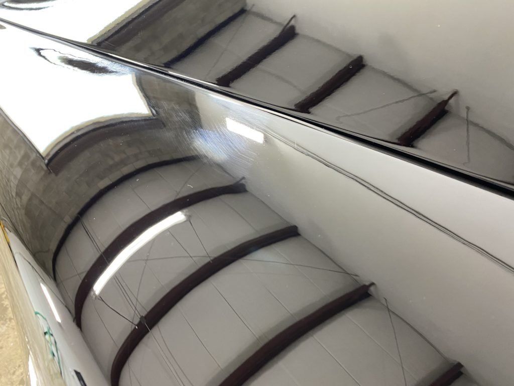 A staircase in a building with a curved ceiling