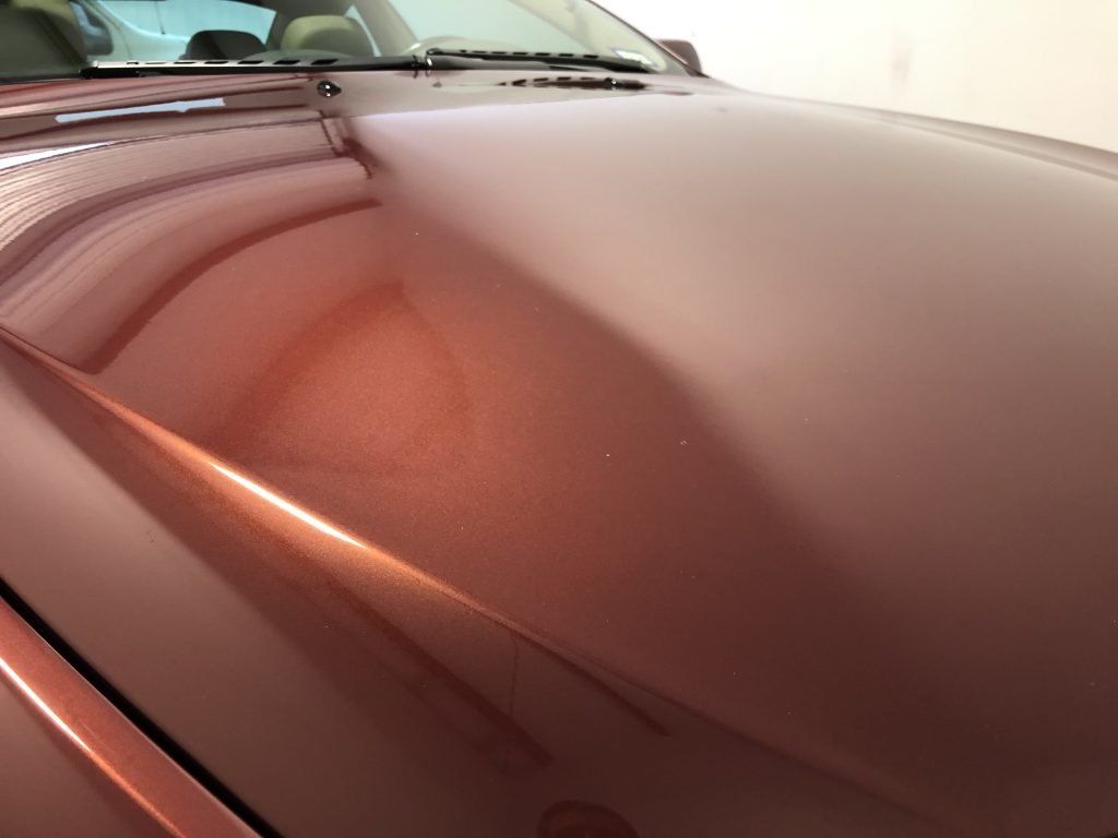 A close up of the hood of a car