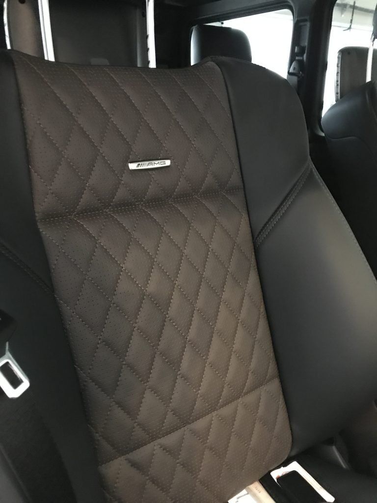 A close up of the back seat of a car