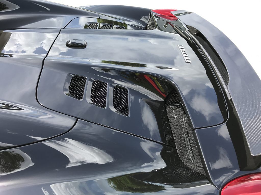 A close up of the back of a ferrari sports car