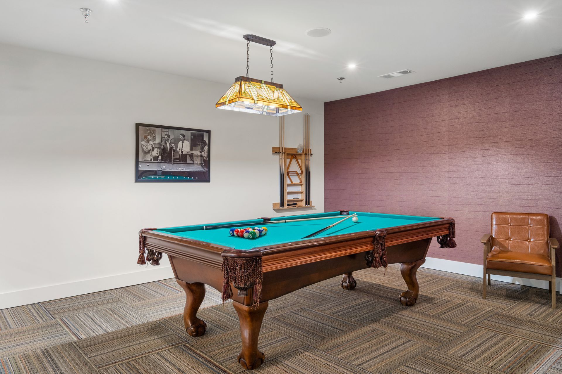 Game room at Clairmont Crest senior living apartments in Decatur, GA.