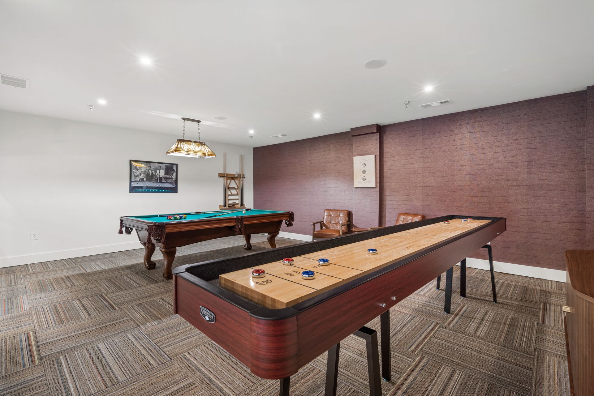 Game room at Clairmont Crest senior living apartments in Decatur, GA.
