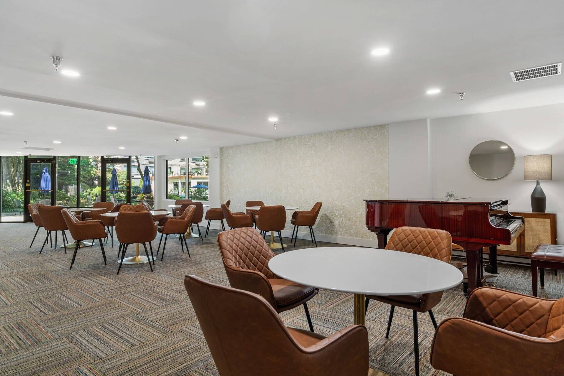 Spacious and well-lit dining area at Clairmont Crest senior living apartments in Decatur, GA.