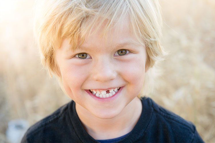 Young boy with missing tooth - Dental Studio 4 Kids Lutz Florida
