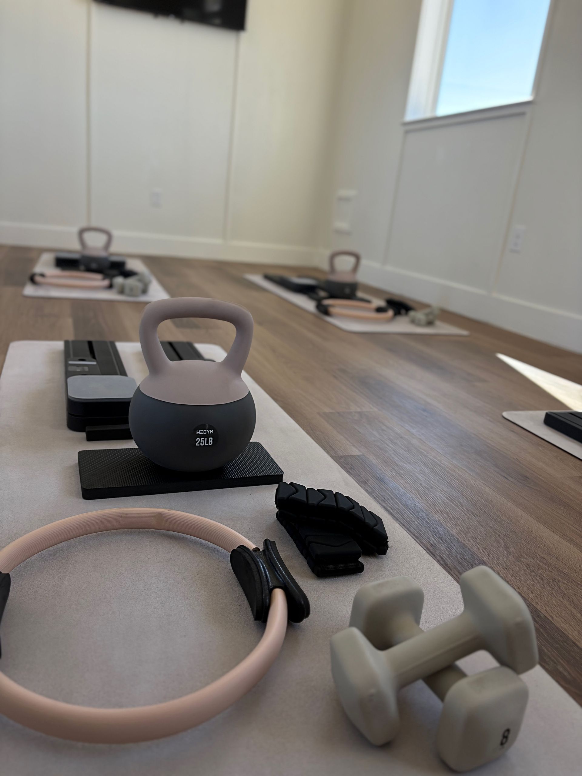 Woman receiving back adjustment, hands on lower back and shoulder. Spine overlay highlights potential pain areas.