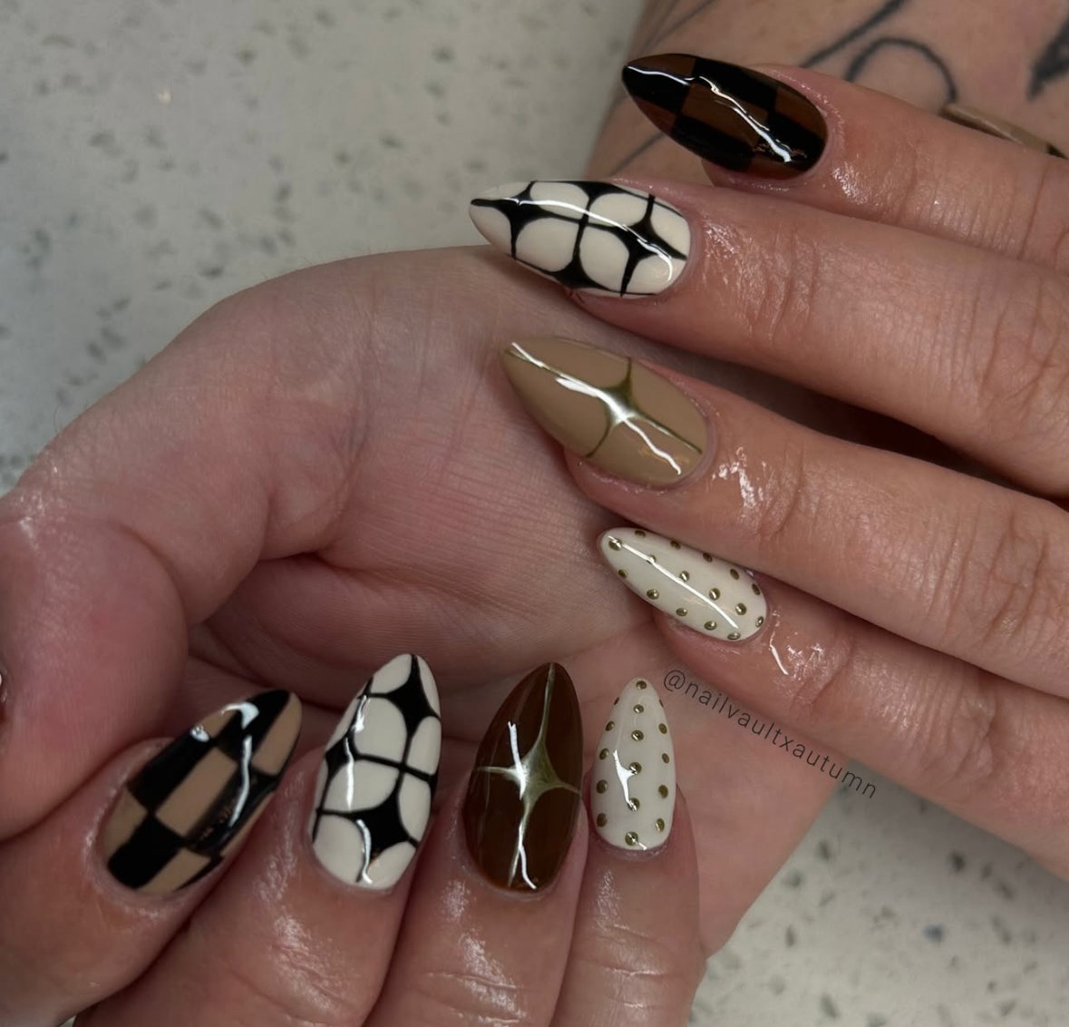 Hands with almond-shaped nails featuring various designs: polka dots, spiral roses, and French tips.