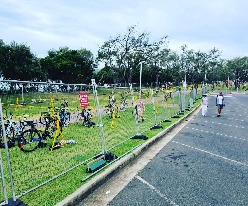 Bunch of Bikes Are Parked in a Grassy Area Behind a Fence — Safety Fence Australia in Middle Pocket, NSW