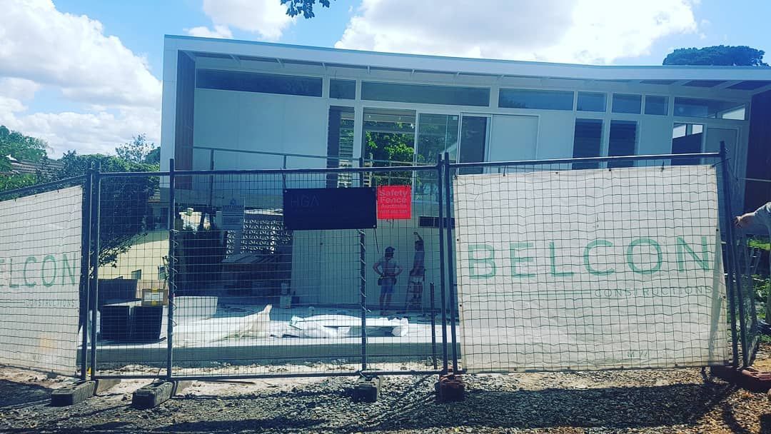 White House is Behind a Fence With a Sign That Says Be Con — Safety Fence Australia in Byron Bay, NSW