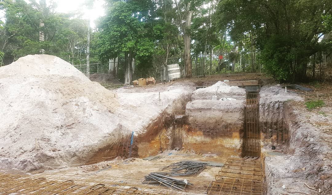 Pile of Dirt is Sitting in the Middle of a Dirt Field — Safety Fence Australia in Pottsville, NSW