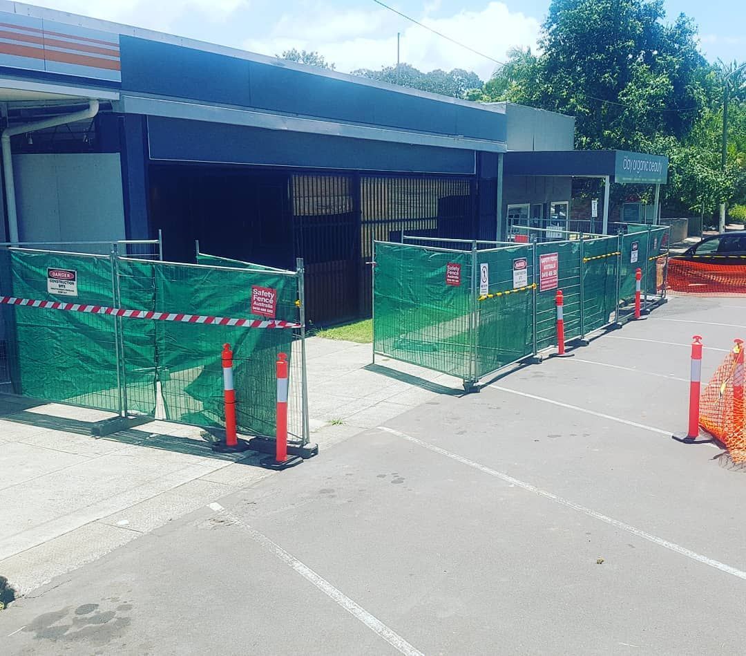 Building is Being Built Next to a Parking Lot — Safety Fence Australia in Tweed Heads, NSW