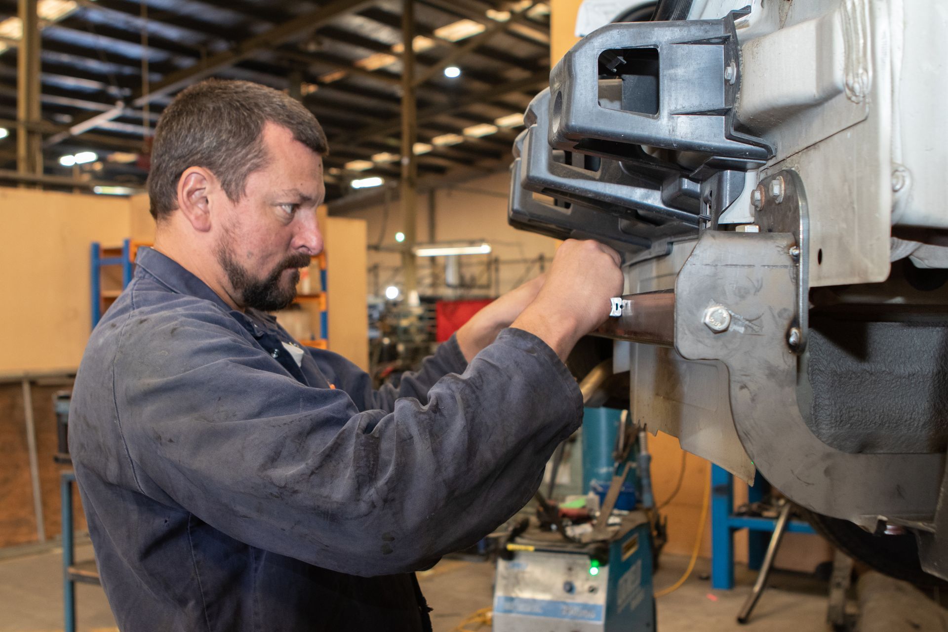Stoprust Team member installing a towbar 