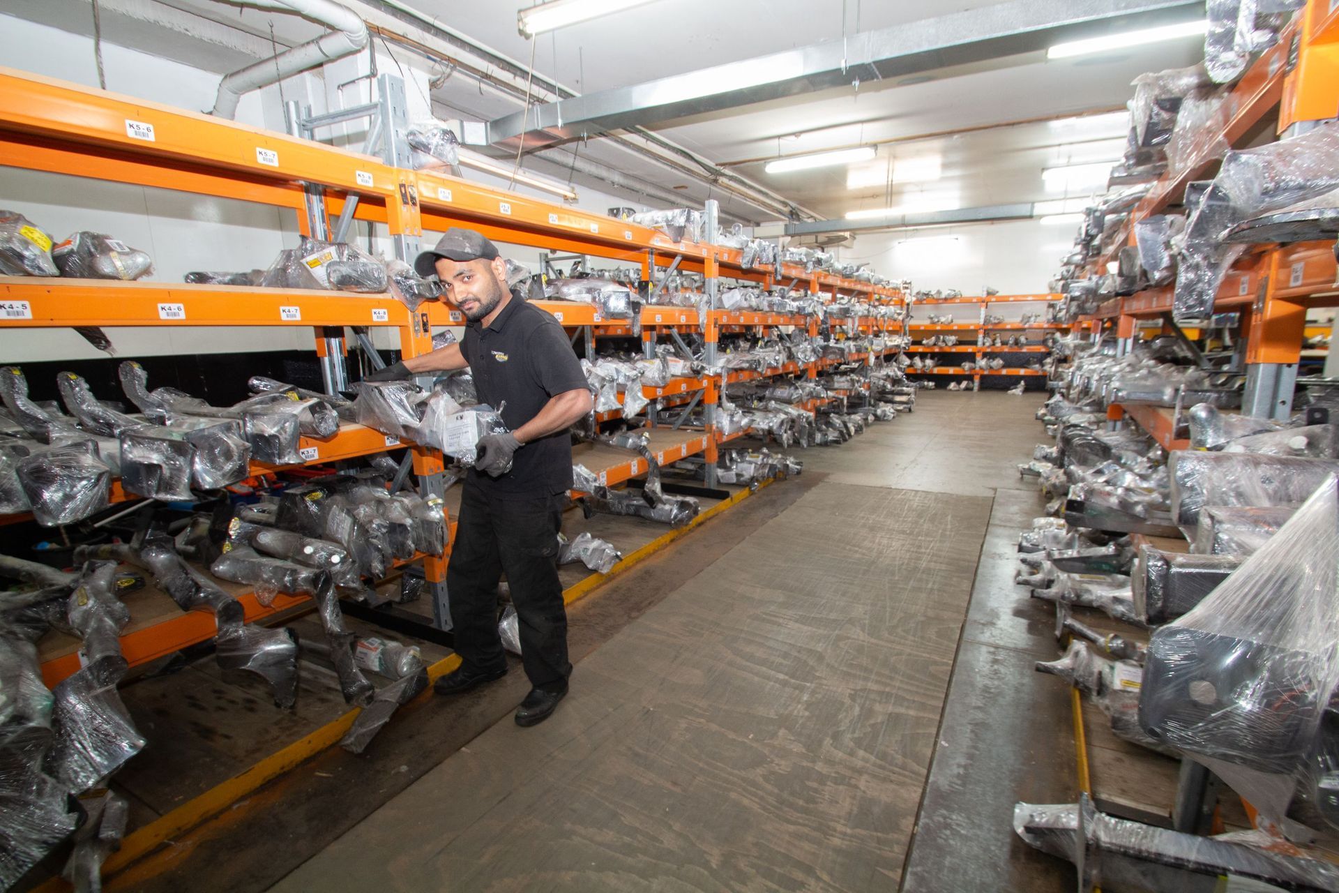 TBX Team member in Warehouse.