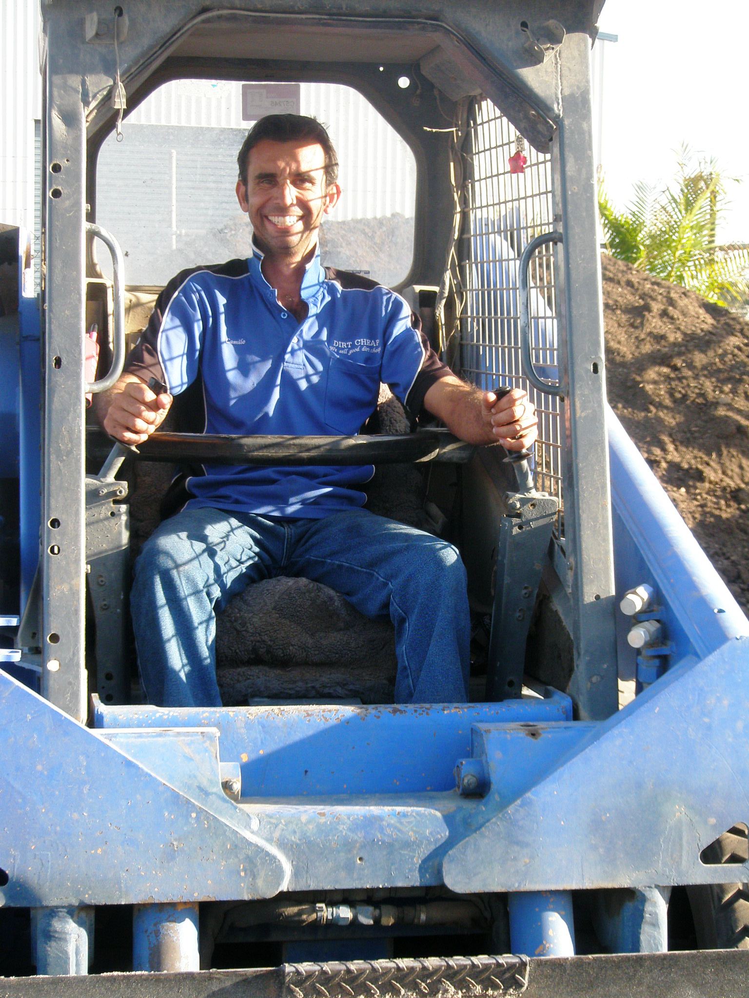 Camilo In Bobcat — Landscaping Supplies in Gladstone, QLD